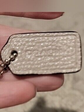 Coach Textured Cream Leather Bag Tag